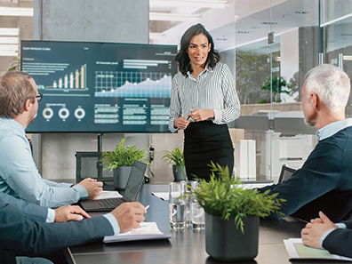 woman presenting at a meeting